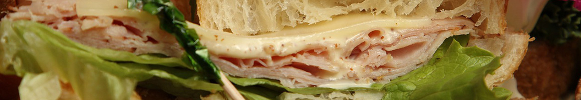 Eating Deli Sandwich at Tony's Deli restaurant in North Hollywood, CA.